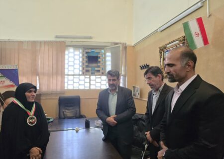 تجلیل از خانواده شهید طالبی با حضور ورزشکاران قمی